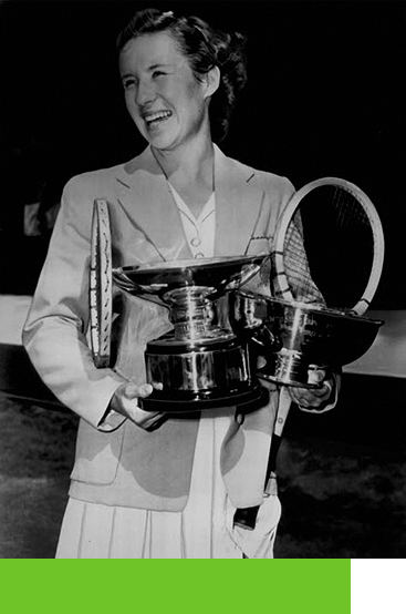 "Little Mo" holding a trophy